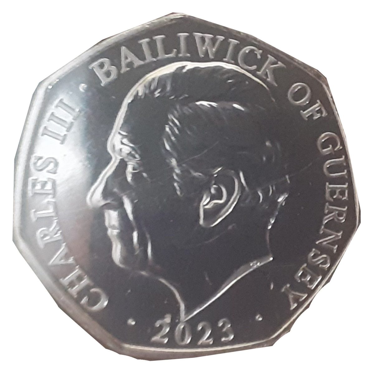 Guernsey 50 Pence - Charles III Coronation Regalia - The Sovereign's Sceptre obverse