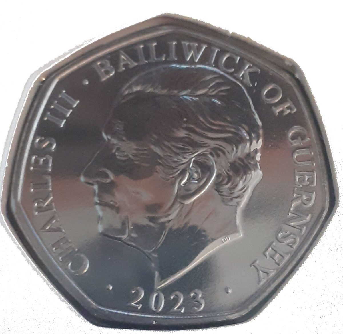 Guernsey 50 Pence - Charles III Coronation Regalia - The Ancient Coronation Spoon obverse