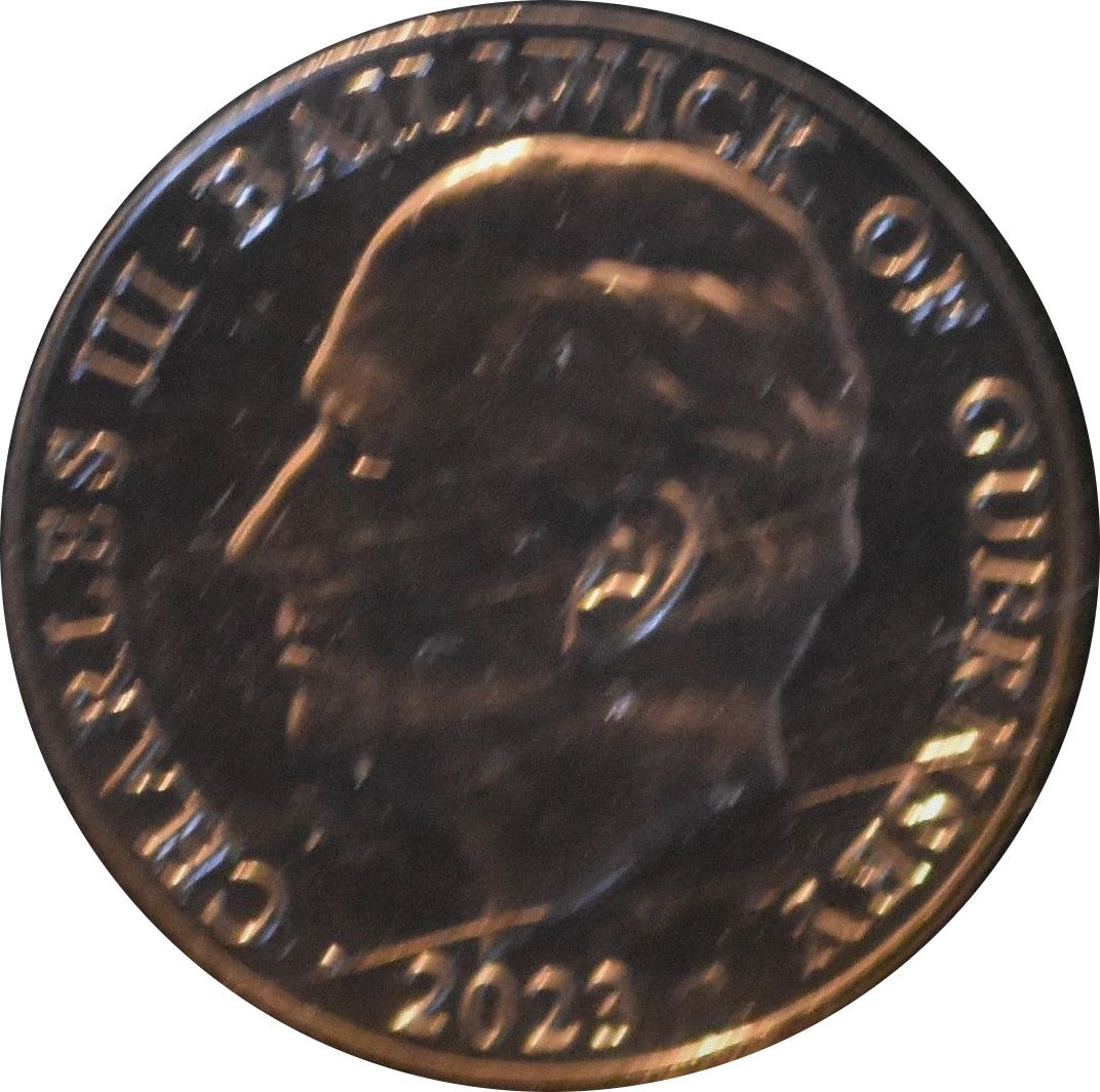 Guernsey 10 Pence - Charles III Carp obverse