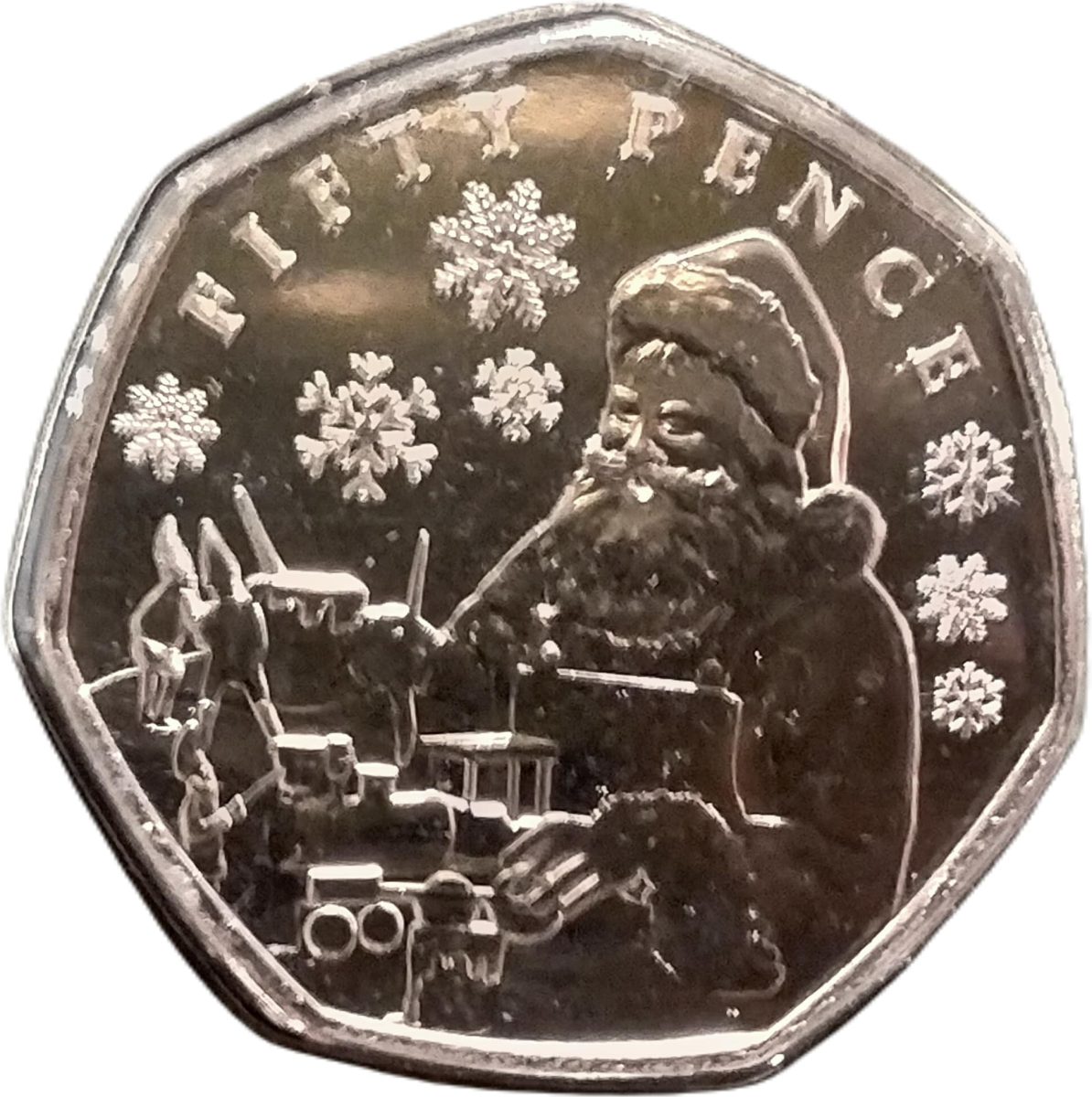 Jersey 50 Pence - Charles III Father Christmas with toys reverse