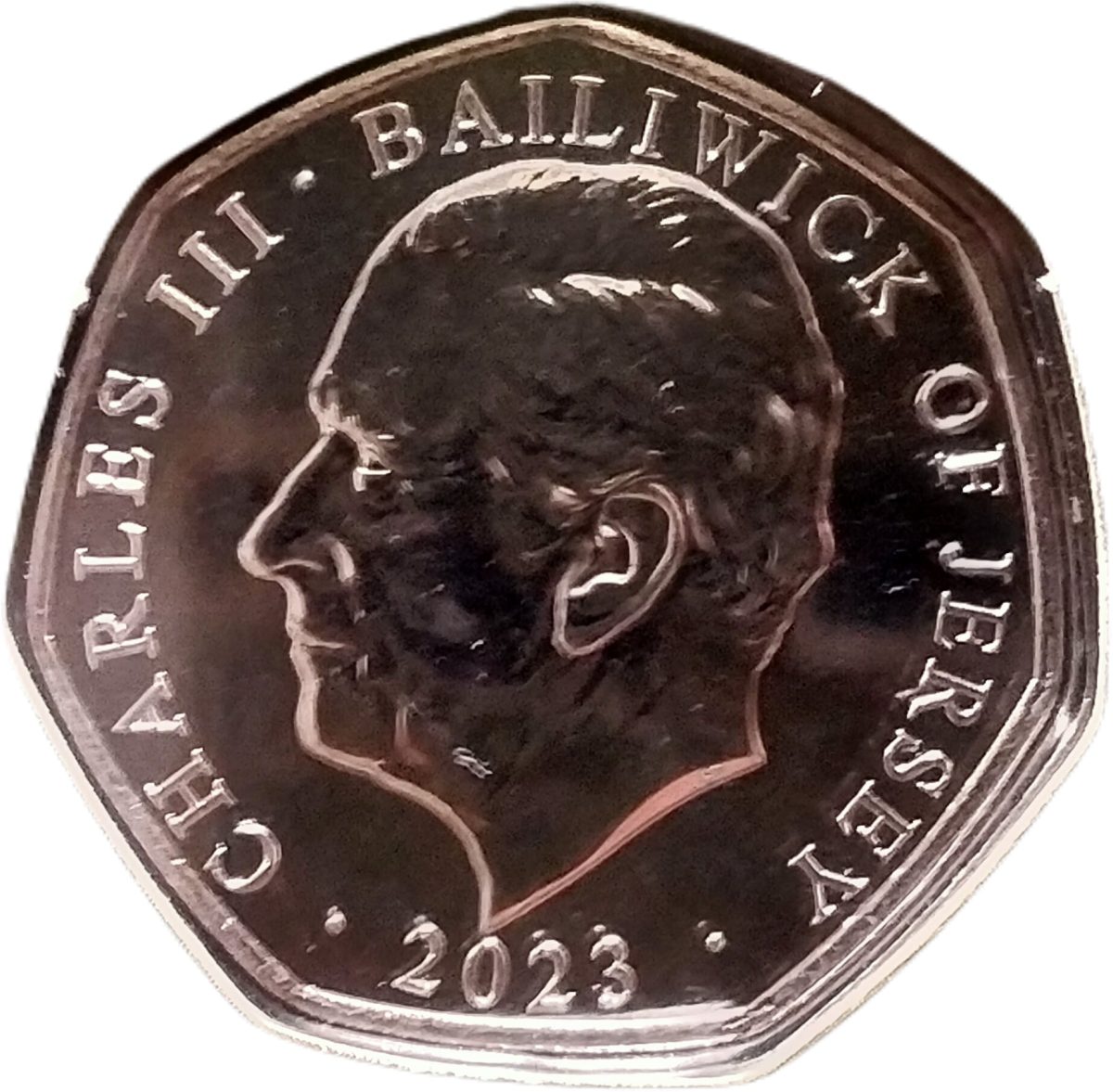 Jersey 50 Pence - Charles III Father Christmas in sleigh obverse