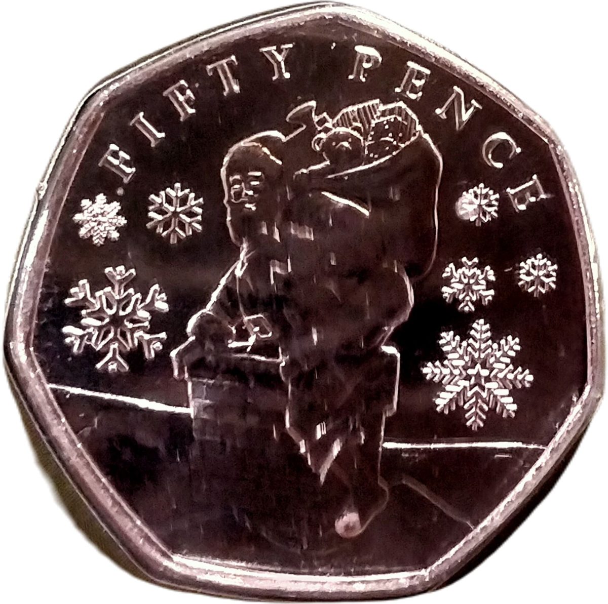 Jersey 50 Pence - Charles III Father Christmas and chimney reverse