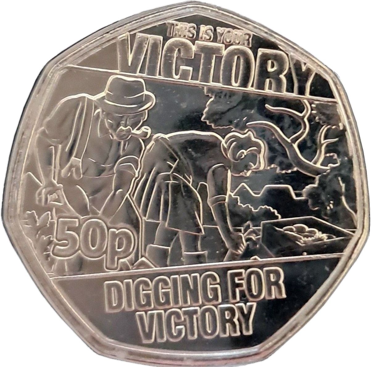 Guernsey 50 Pence - Charles III Digging for Victory reverse