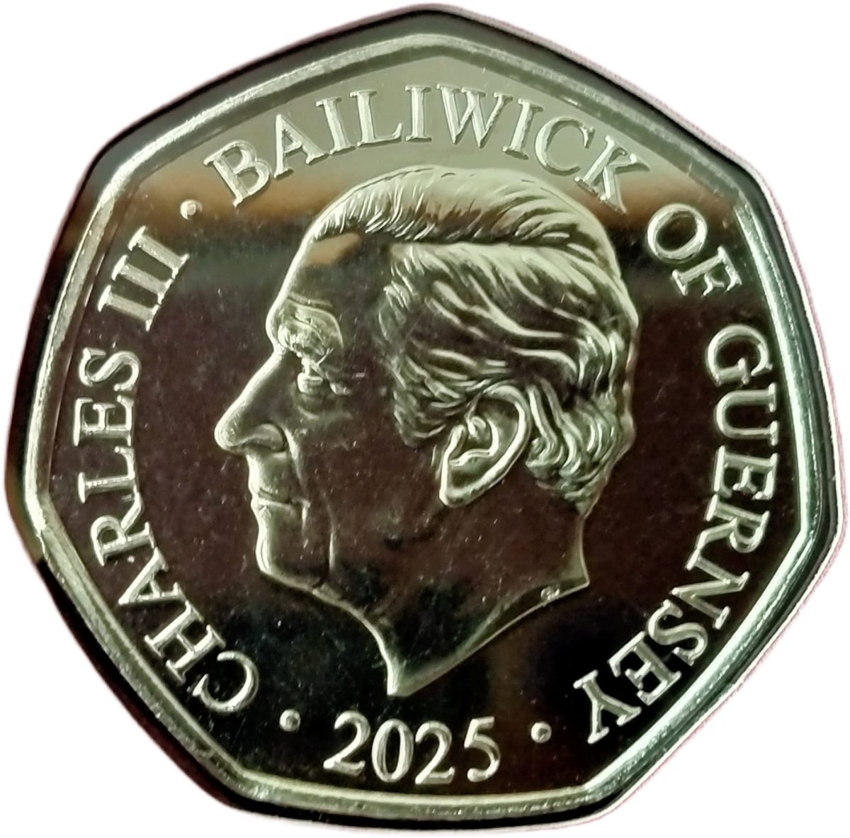 Guernsey 50 Pence - Charles III A Robin in a Holly Tree obverse