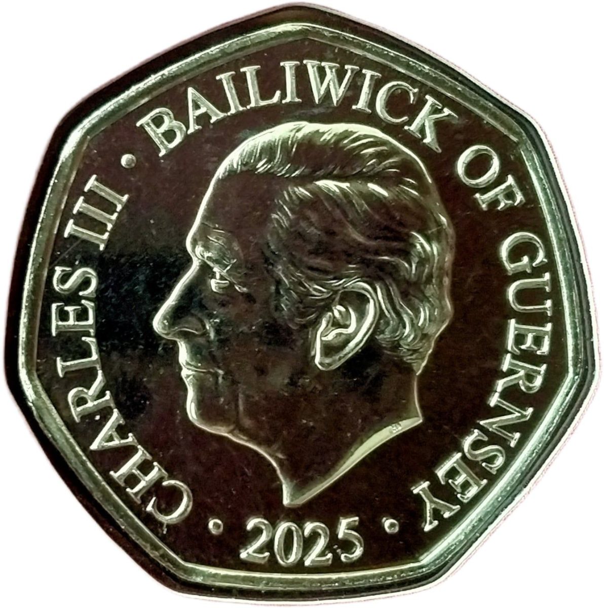 Guernsey 50 Pence - Charles III A Robin on a wall obverse