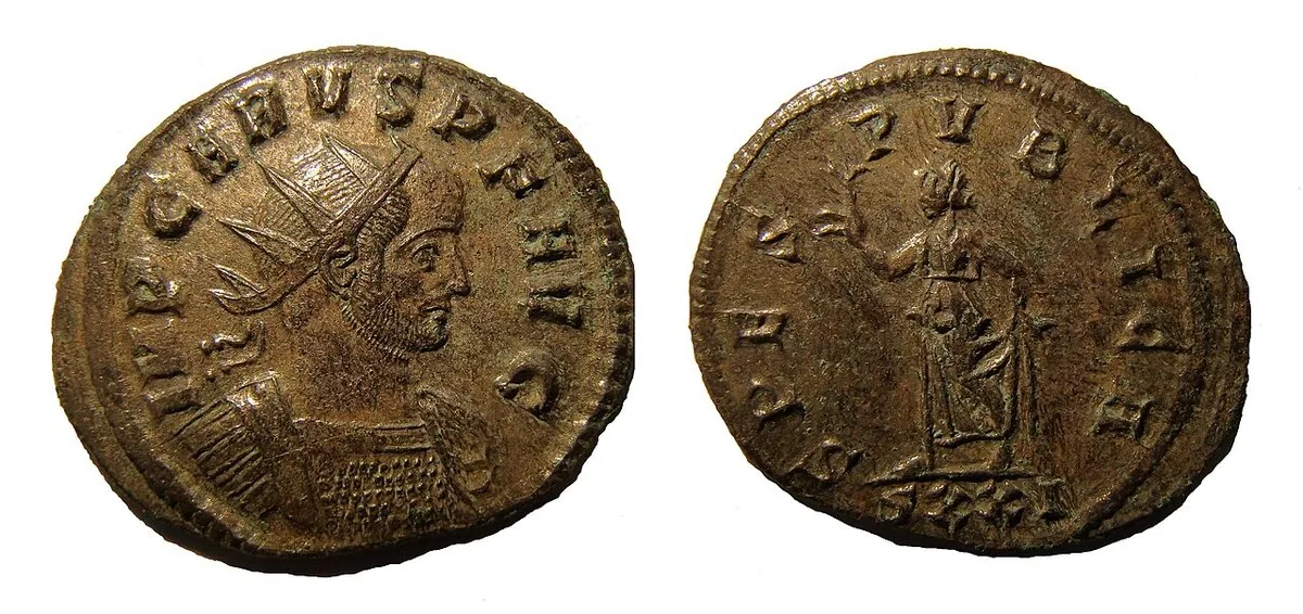 Copper alloy Roman coin of Carus after cleaning for identification