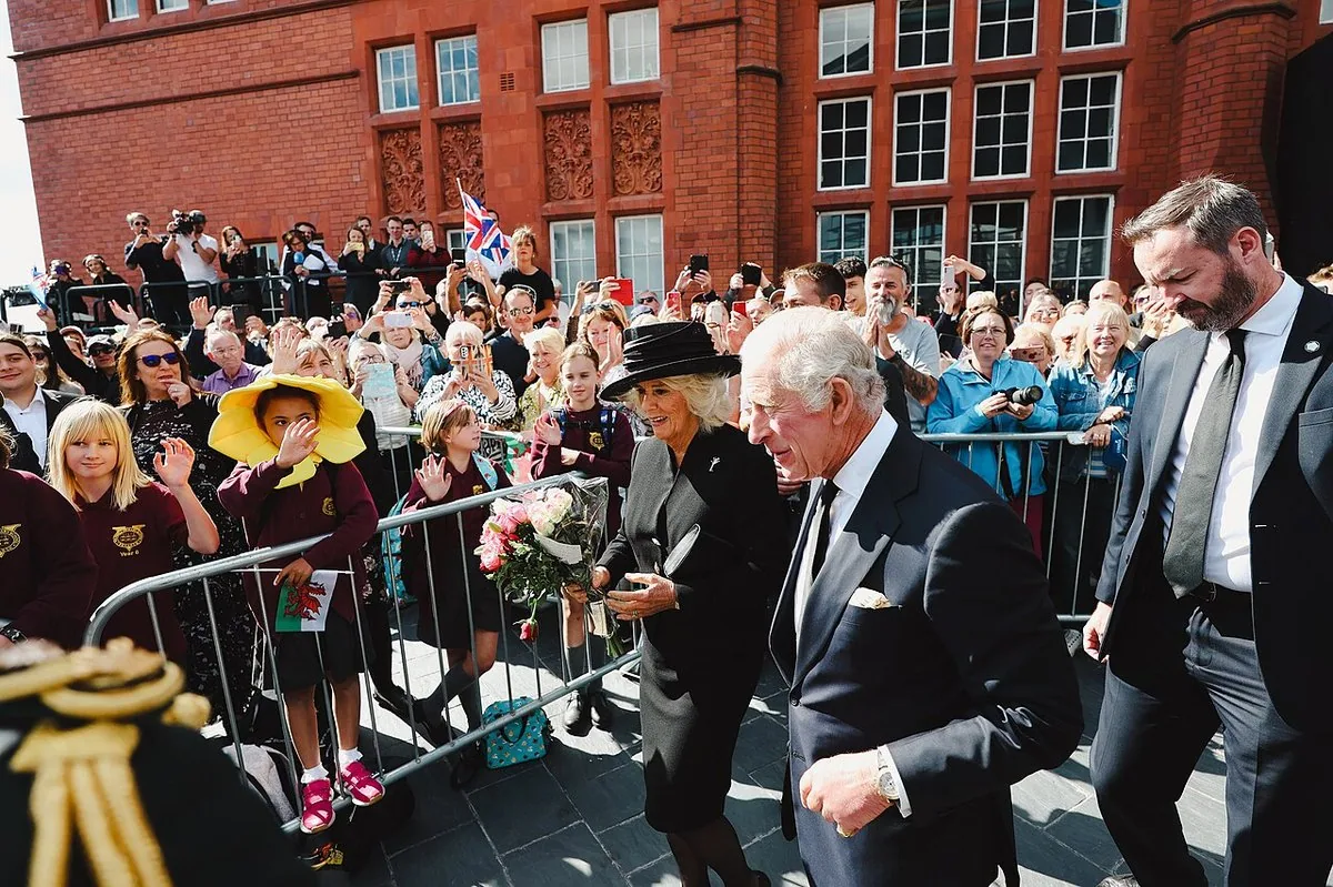 King Charles III and the Queen Consort greeting crowds outside the Senedd in Cardiff, September 2022
