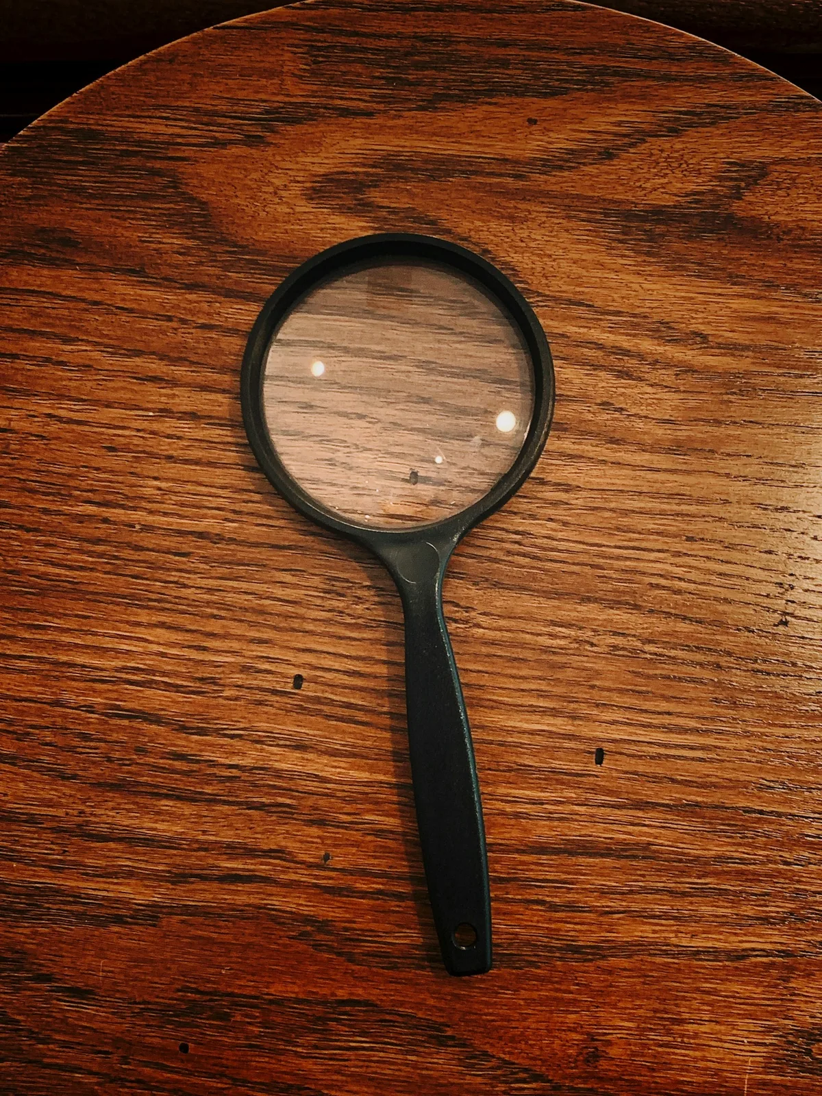 Black-framed magnifying glass Black-framed magnifying glass