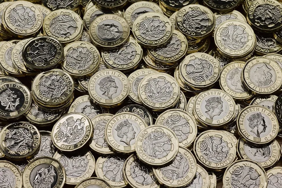 Several new 12-sided £1 coins Several new 12-sided £1 coins