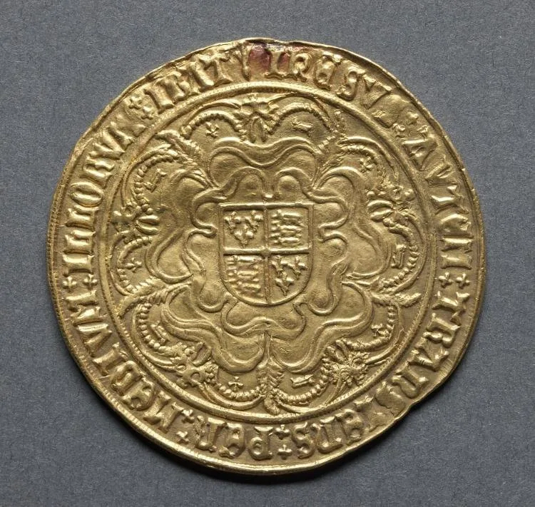 Tudor sovereign reverse Reverse of a Tudor gold sovereign with royal arms on a Tudor rose