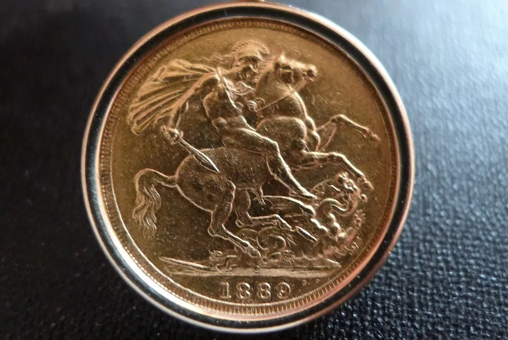 An antique gold sovereign showing St George