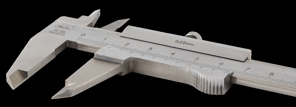 Vernier caliper of the kind used to measure a coin's diameter Vernier caliper of the kind used to measure a coin's diameter