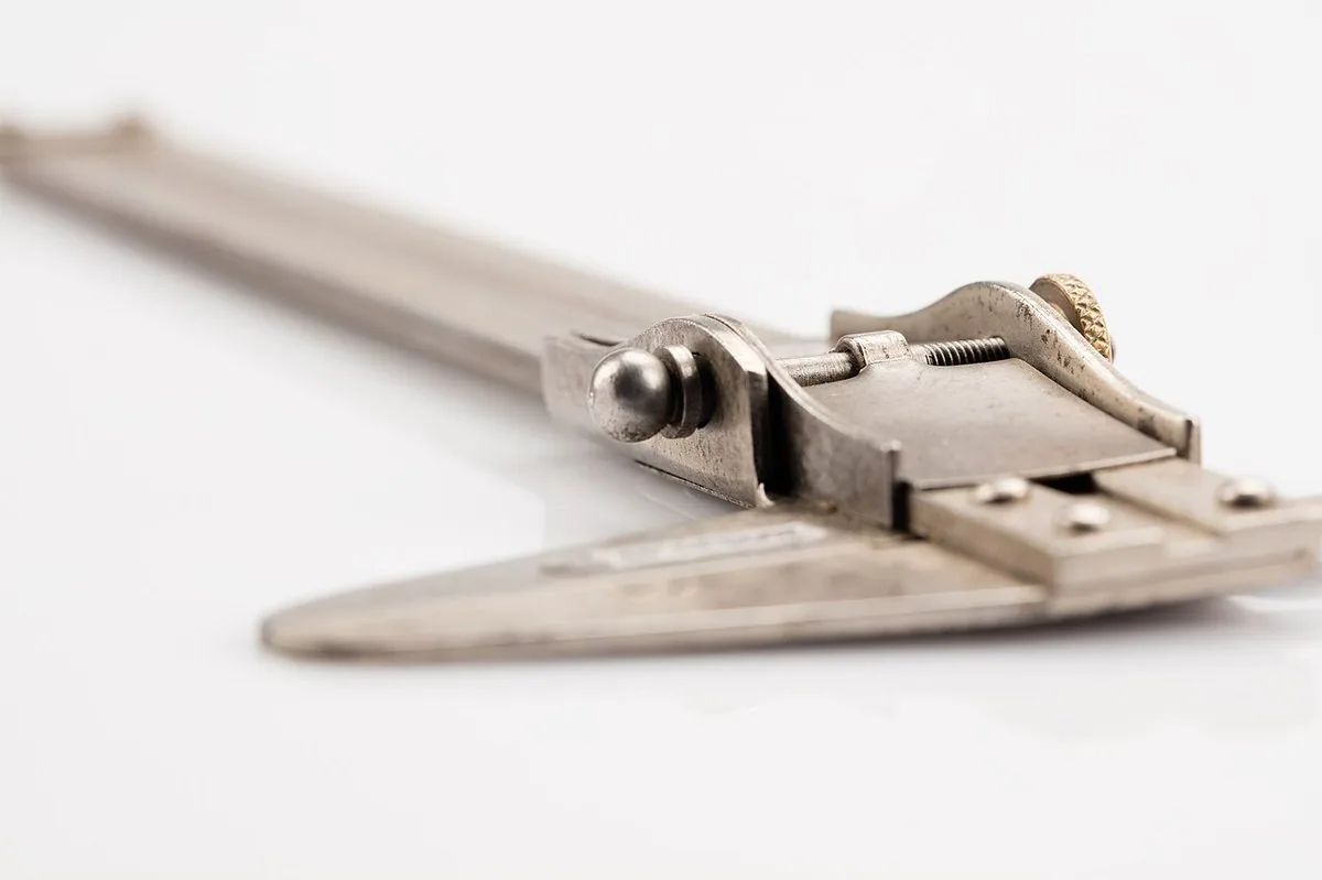 An antique sliding vernier caliper